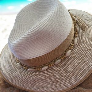 Caribbean Joe beach hat.  Shell band. Sun Protection of 50+.  Adjustable band.